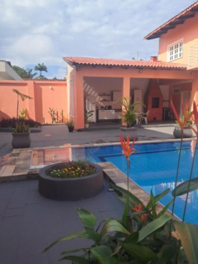 Casa Rosa Suites de Hóspedes a 3 min de caminhada da Praia da Ponta N